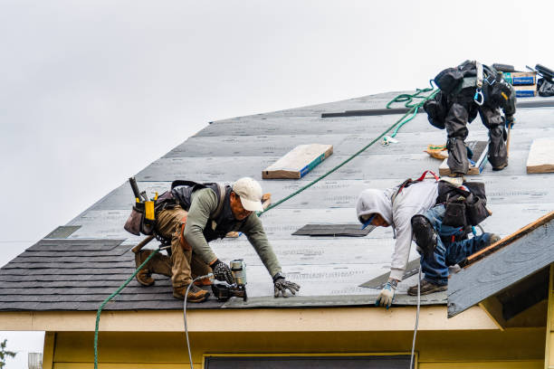 Professional Roofing technician working in Topeka, IN